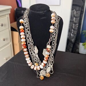 Artistic Silver Necklace with Orange Beads